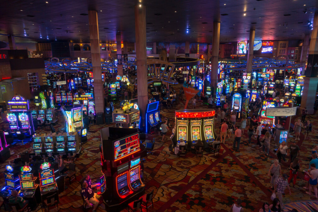 People playing slot machines at MGM casino.